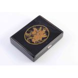 A FINE CARTIER BLACK ENAMEL AND GILDED COMPACT WITH DIAMOND SET CLASP, Jacques Cartier, London 1937,