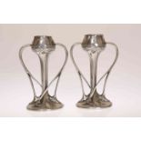 A PAIR OF LIBERTY & CO TUDRIC PEWTER TULIP VASES, DESIGNED BY ARCHIBALD KNOX,
