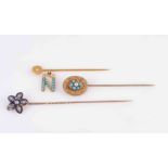 A COLLECTION OF THREE TIE PINS, CIRCA 1870-1880, to include a turquoise and diamond set tie pin,