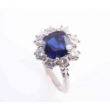 A SAPPHIRE AND DIAMOND RING,