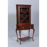 A LATE VICTORIAN MAHOGANY CABINET ON STAND,