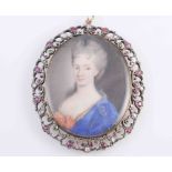 A DIAMOND, RUBY AND EMERALD SET MINIATURE, circa 1840, the portrait miniature of a lady,