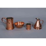 A GROUP OF COPPER ITEMS, comprising three jugs and a bowl.