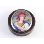 A TORTOISESHELL CIRCULAR PILL BOX, inset with a miniature of a Roman Empress holding a spear,