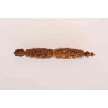 COQUILLA NUT NEEDLE CASE, EARLY 19TH CENTURY, carved with a figure head,