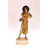 AN ART DECO GILDED SPELTER FIGURE OF A FEMALE FLAMENCO DANCER, PROBABLY AFTER LORENZL,