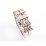 A DIAMOND RING, the four pairs of brilliant cut diamonds each horizontally set,