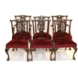 A SET OF SIX CHIPPENDALE STYLE MAHOGANY DINING CHAIRS, including a pair of carvers,
