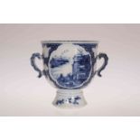 A CHINESE BLUE AND WHITE TWO-HANDLED CUP,