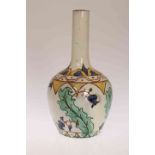 CARLO MANZONI, AN ARTS AND CRAFTS POTTERY VASE, the ovoid body issuing a cylindrical neck,