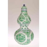 A CHINESE DOUBLE GOURD BOTTLE VASE AND COVER,