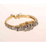 A FAVRE-LEUBA 1960'S CONCEALED DIAL LADY'S BANGLE WATCH, IN ART DECO STYLE, set with faux diamonds,
