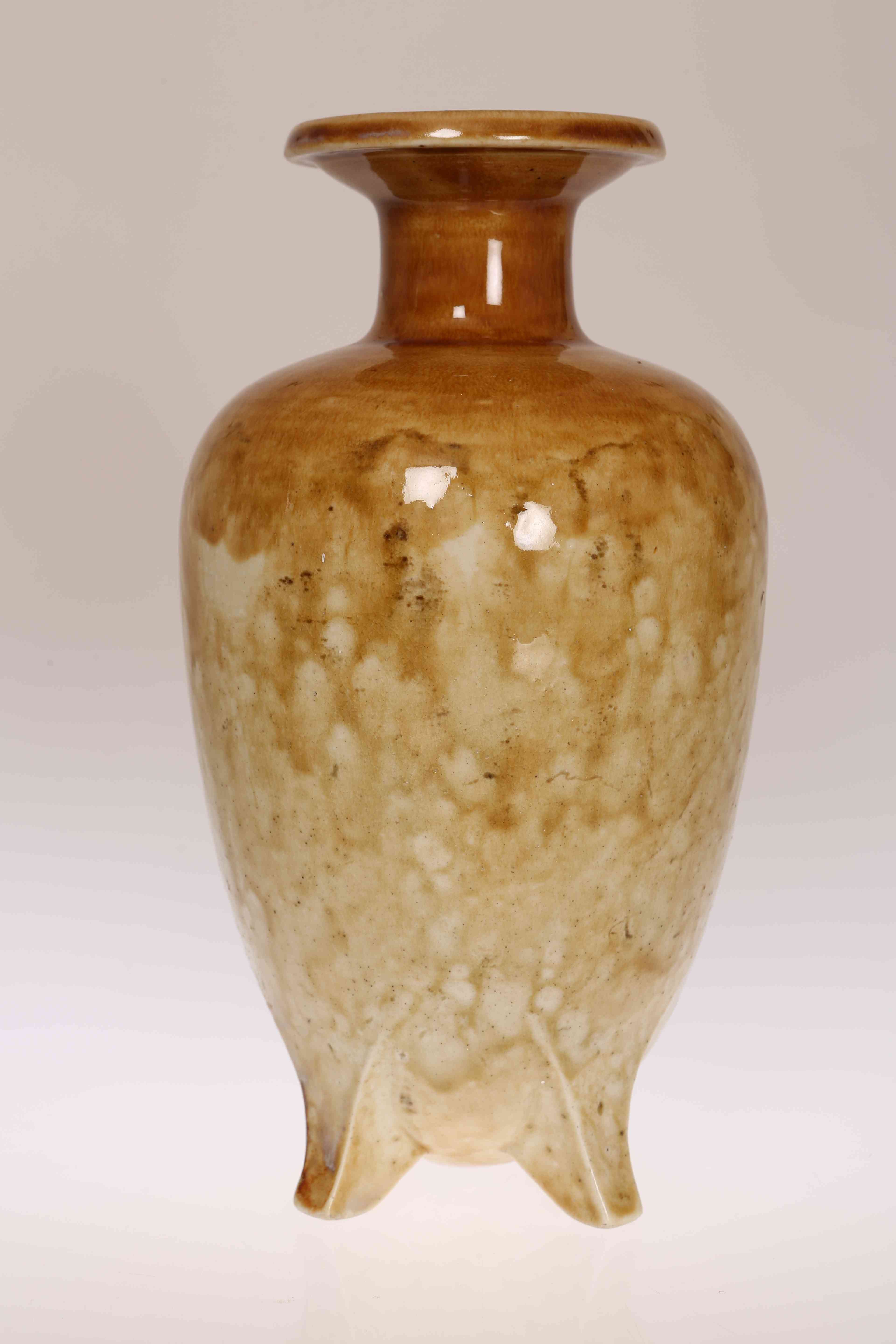 A MARTIN BROTHERS VASE, of baluster form with brown glaze, signed Martin Bros,