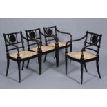 A SET OF FOUR REGENCY STYLE EBONISED AND CANEWORK HALL CHAIRS, LATE 19TH CENTURY,