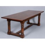 A GOOD OAK REFECTORY TABLE IN 18TH CENTURY STYLE, the five plank dowelled top and enclosed ends,