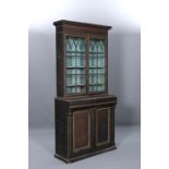 A REGENCY PAINTED PINE BOOKCASE CABINET,