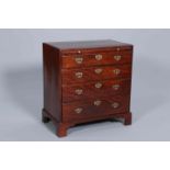 A GEORGE III MAHOGANY CHEST OF DRAWERS,