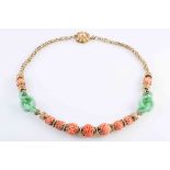 A CORAL AND JADEITE NECKLACE,