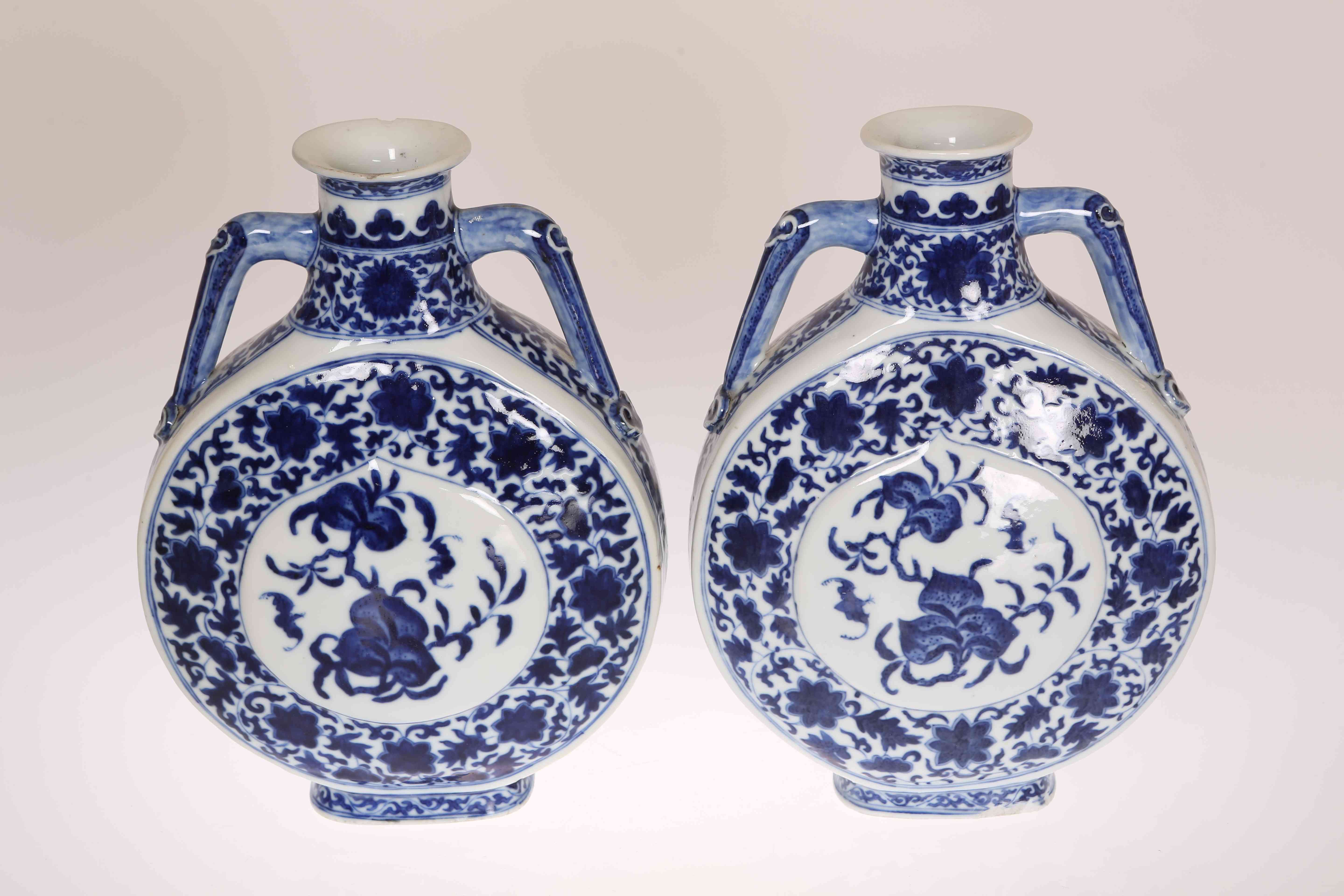 A PAIR OF CHINESE BLUE AND WHITE MOON FLASKS, 19th Century,