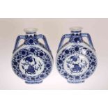 A PAIR OF CHINESE BLUE AND WHITE MOON FLASKS, 19th Century,