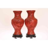 A PAIR OF CHINESE CINNABAR LACQUER VASES, CIRCA 1900, of baluster form,