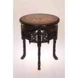 A CHINESE MARBLE-INSET HARDWOOD JARDINIERE STAND, CIRCA 1900,