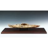 CASED NATIVE MADE KAYAK MODEL - Inuit style, 19th c., sinew sewn seal skin over cedar wood frame,