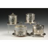 (4) SILVER PLATE BISCUIT JARS - All English, Georgian Style, engraved, two round and two oval,