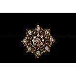 BROOCH/ PENDANT - 14K Yellow Gold Victorian Snowflake Form Brooch; having fine reticulated setting
