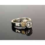 LADY'S RING - One 14K white and yellow gold handmade ring in a contemporary design, set with one