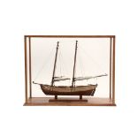 CASED SHIP MODEL - "Schooner 'Paulie', ca. 1900", by Harry McCreery, unmarked. In mahogany and