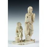 19TH C JAPANESE CARVING - Meiji Period Cabinet Figure or Okimono, of a child bringing lunch to his