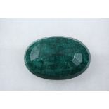 OVAL EMERALD FACETED PAPER WEIGHT - Weighing 859.30 carats, Certificate No. 122811-CM-AA11-THP