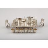 Twelve piece Chinese silver and white metal miniature tea service, including a tray engraved with