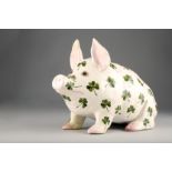 Large Wemyss pottery pig, modelled seated on its haunches, hand painted with shamrocks, painted