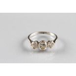 Ladies platinum three stone diamond ring, centre stone 0.75 carat flanked either side by 0.33