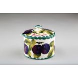 Wemyss pottery biscuit barrel and cover, decorated with hand painted plums, signed in green to base.