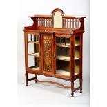Arts and Crafts mahogany display cabinet, galleried back with central arched mirror over a