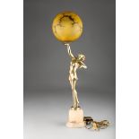 Silvered Spelter Art Deco figure table lamp, a dancing girl outstretched on her toes holding the