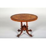 Victorian mahogany and walnut window table, oval top over four tapering pillared pedestal, raised on