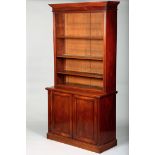 Victorian mahogany open bookcase and cupboard, plain cornice over open shelves above a twin panelled