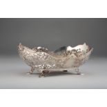 Silver bread basket, oval form pierced scroll work sides with vacant heart shaped cartouche,