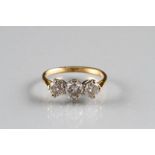 Ladies three stone diamond ring, yellow gold centre stone 0.5 carat flanked either side by 0.25