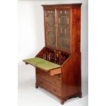 Edwardian mahogany bureau bookcase, dentil cornice over twin astragal glazed doors over a sloping