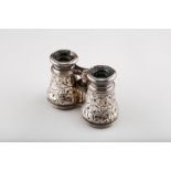 Pair Victorian silver Le Jockey Club, Paris field glasses decorated in embossed scrolls, assay