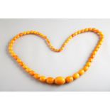 Ladies butterscotch amber oval bead necklace, graduated beads, largest 35mm long to smallest 10mm