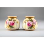 Pair of Royal Worcester vases, squat and lobbed form, hand painted with mixed roses, date coded