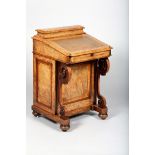 Victorian burr walnut and boxwood inlaid Davenport, with an ogee outlined stationary compartment