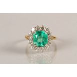 Ladies Emerald and Diamond Cluster Ring, 3.87 carat emerald surrounded by brilliant cut diamonds