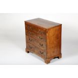 George III Mahogany chest of four graduated drawers, raised on bracket feet. 84cm long 46cm wide